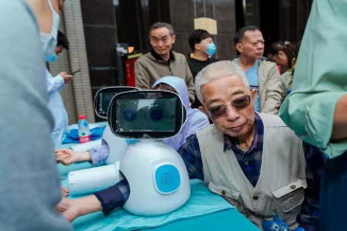 MediPlus robot with a user